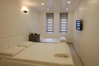 Chambre Deluxe double ou twin avec baignoire spa — Full House Hostel
